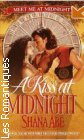 Couverture du livre intitulé "A kiss at midnight"